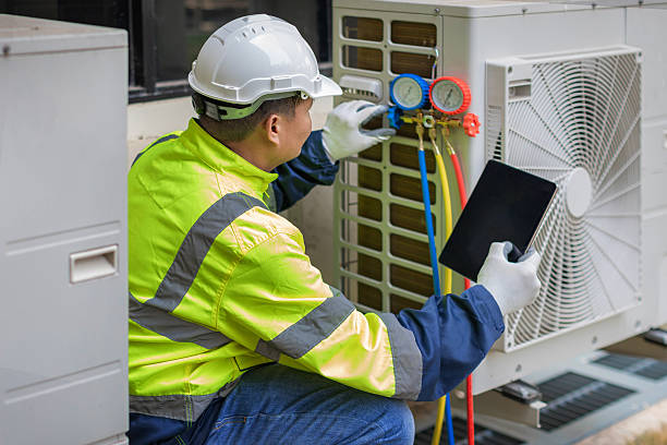 Professional Hvac technician working in Woburn, MA
